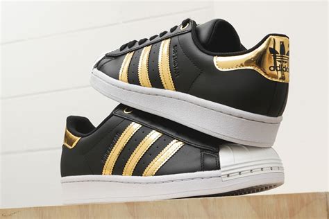 gold adidas superstar shoes